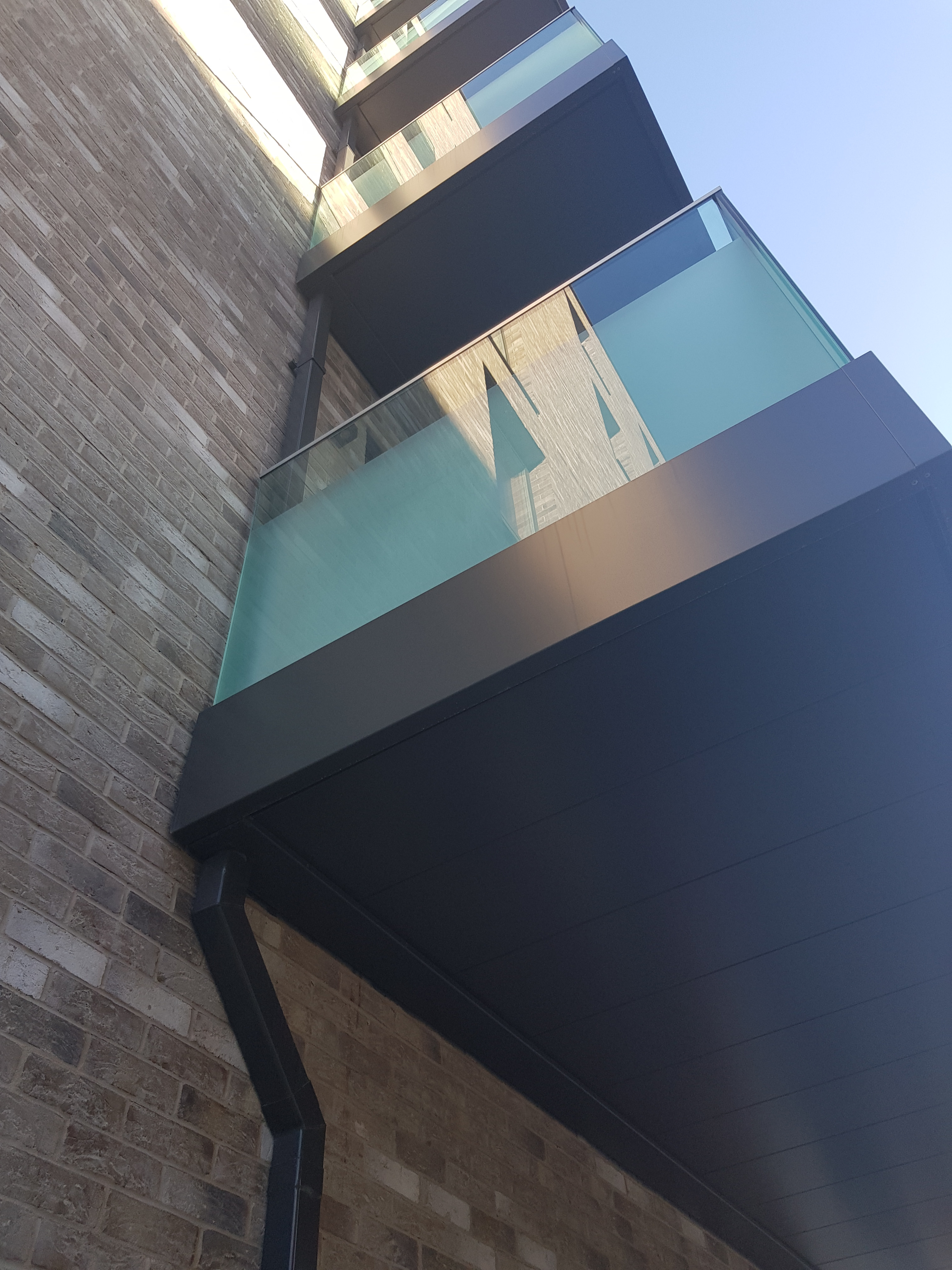 greenwich millennium village phase 5 glide on balconies sapphire laminate glass piped drainage